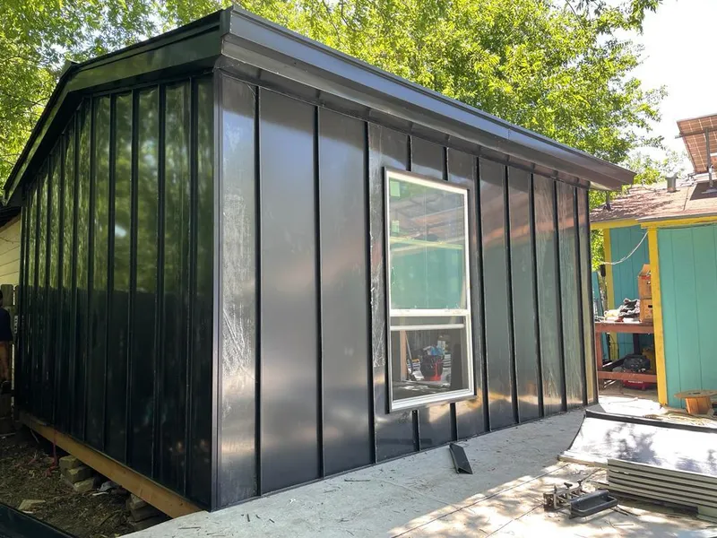 Black standing seam metal wall panels for Roof Inspection in Oceanside